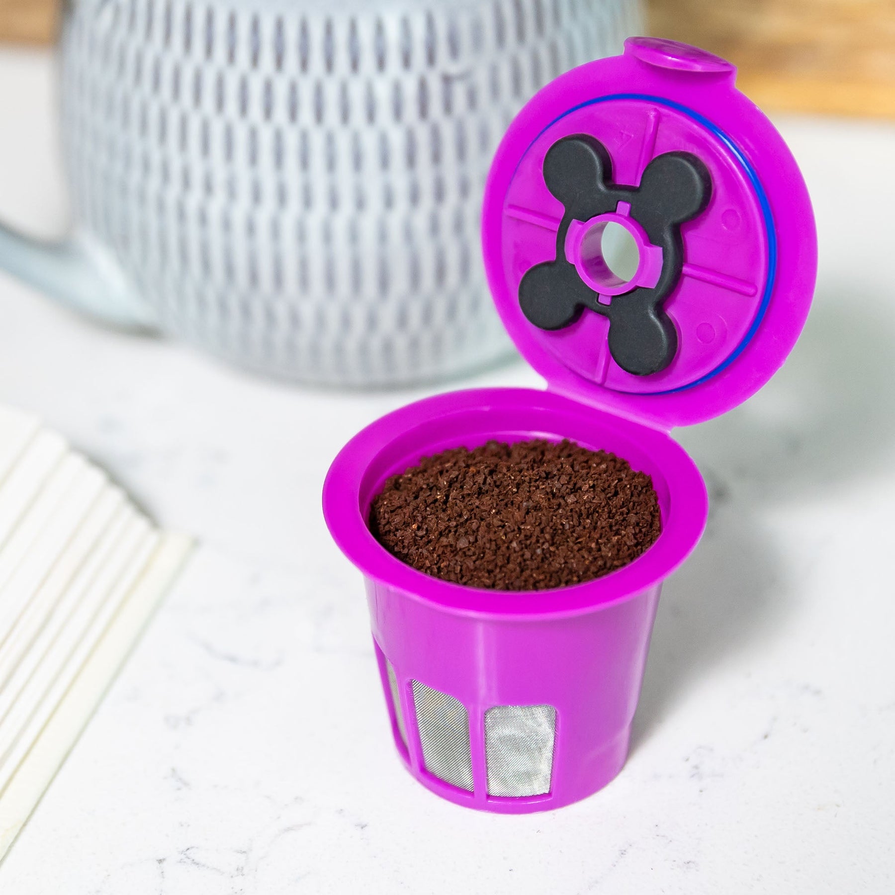 Single serving coffee filters top